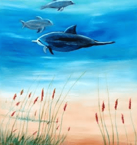 Dolphins Swimming Under Water